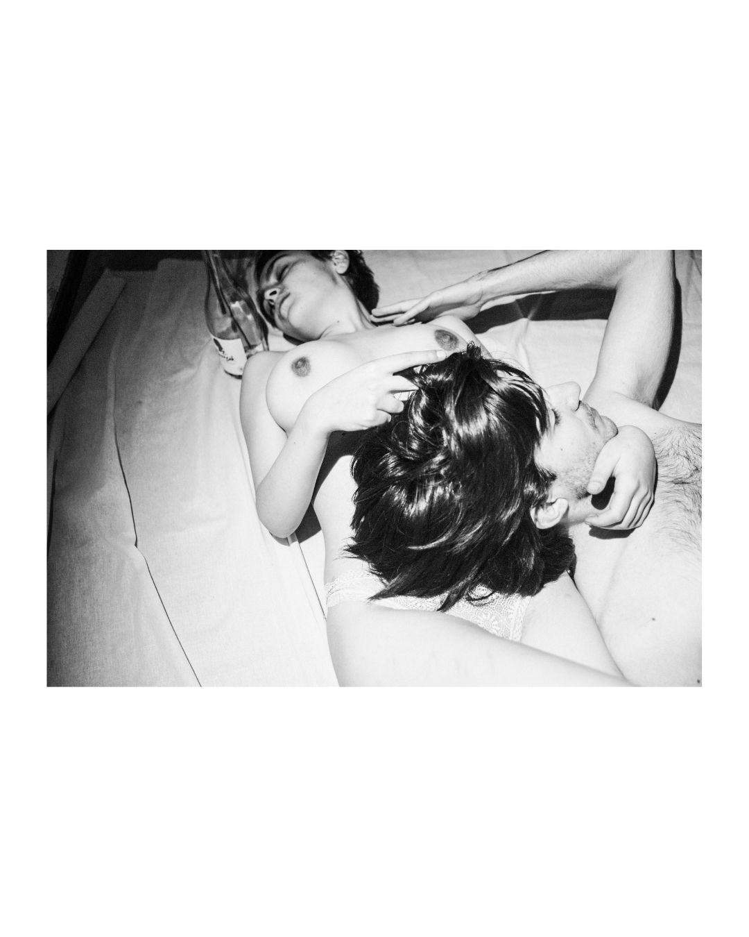 Black-and-white study of closely arranged figures and cropped bodies by Lilit L Hovhanni.