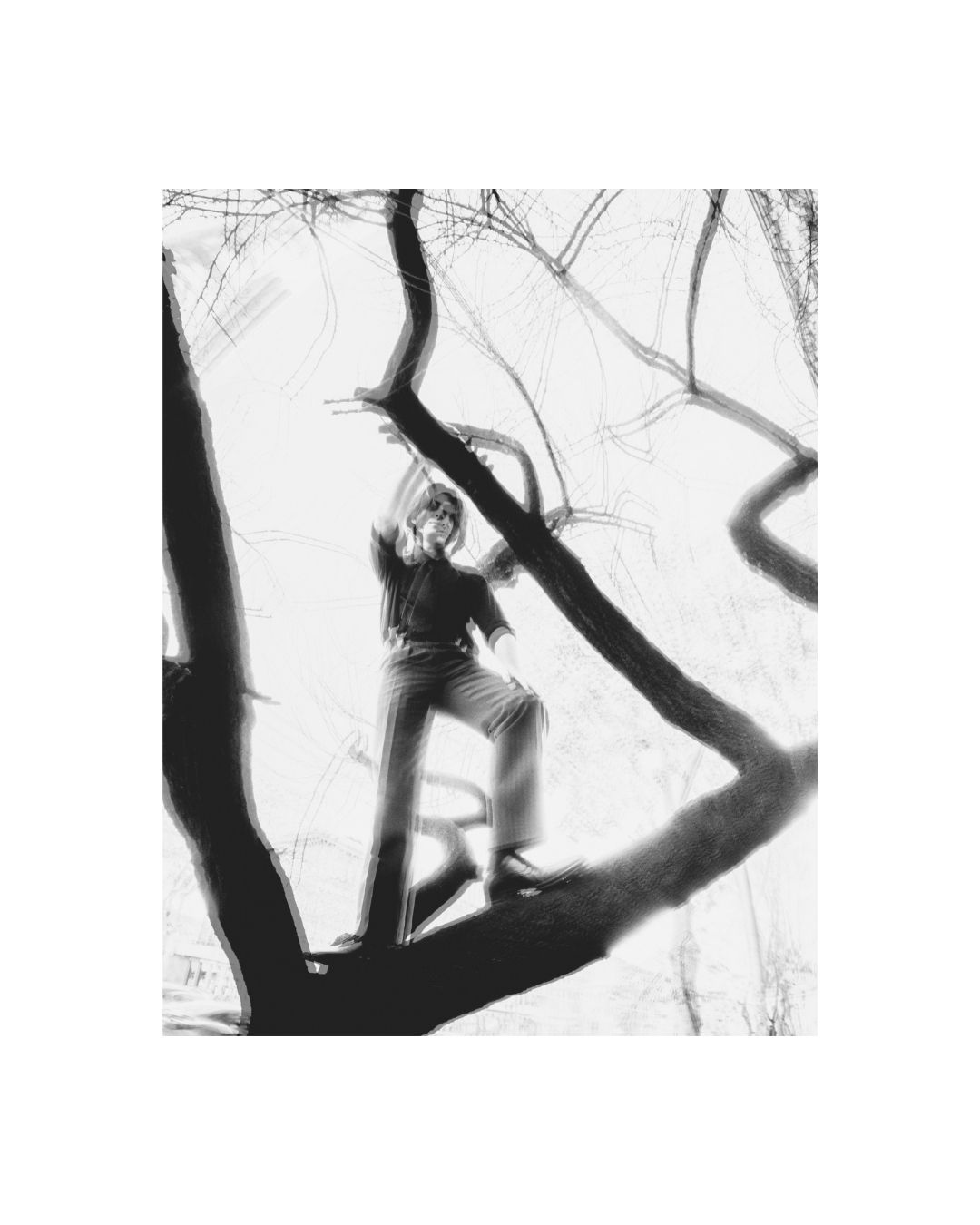 A man in dark clothing in an outdoor black and white composition by Lilit L Hovhanni.