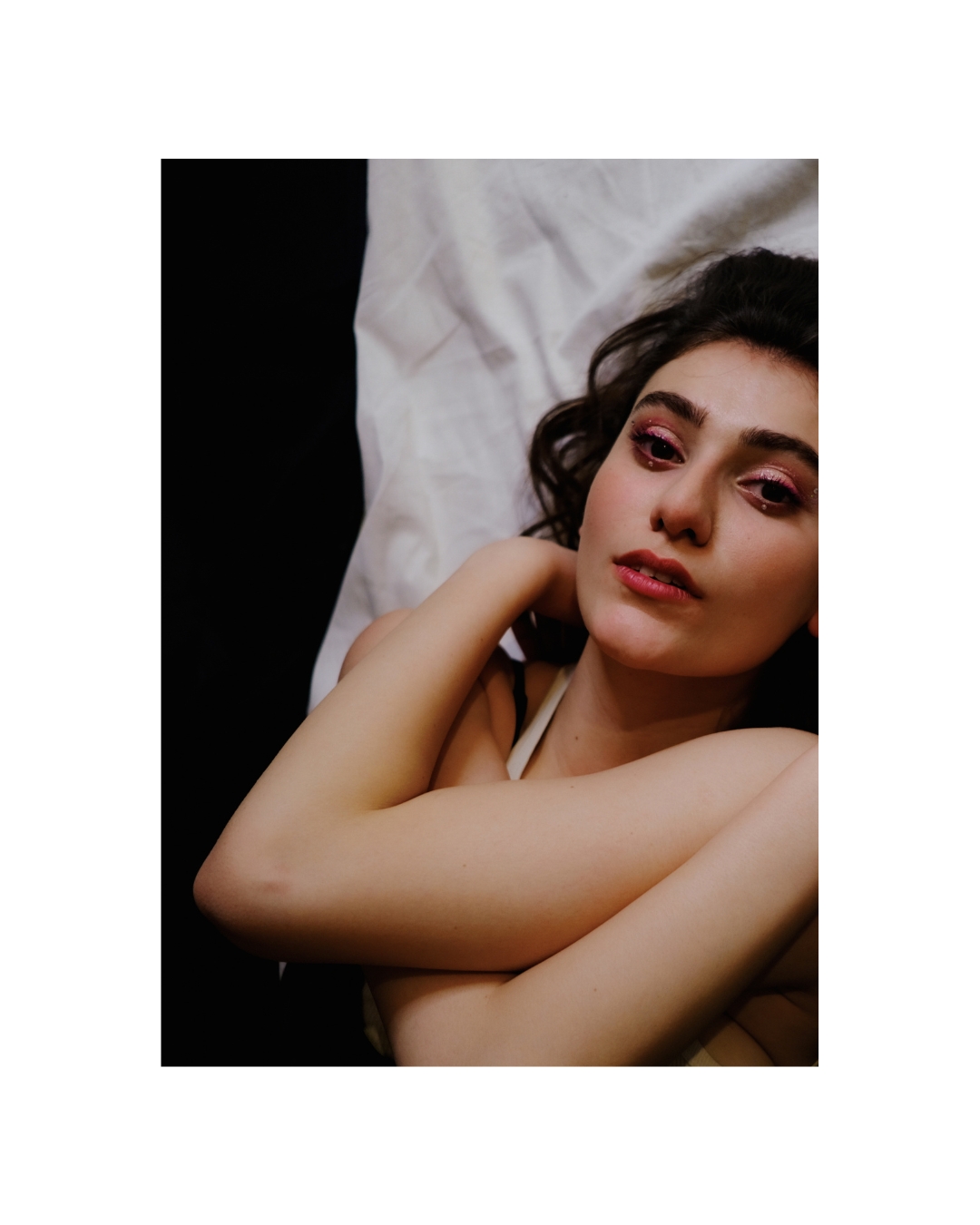 Tightly framed portrait of a woman with dark hair and a direct gaze, by Lilit L Hovhanni.