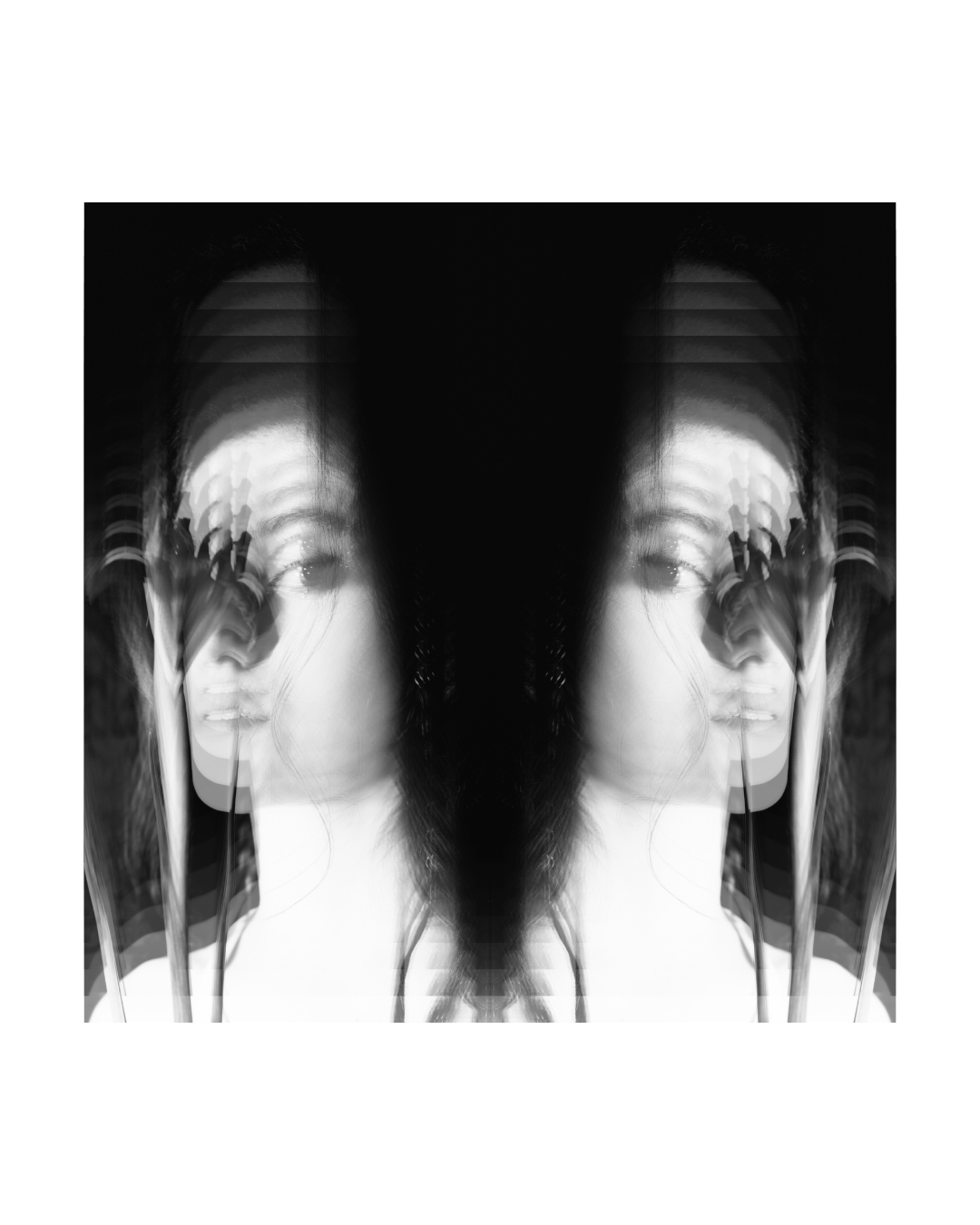 Tightly framed portrait of a woman with dark hair and a direct gaze, by Lilit L Hovhanni.