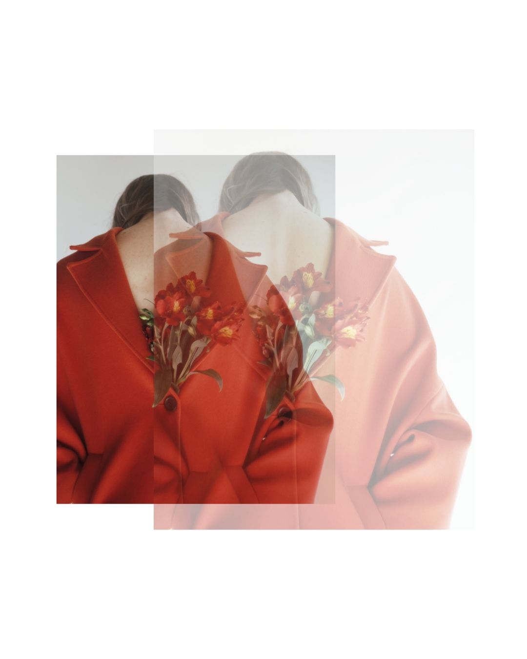 A figure in a red coat against a pale indoor background, photographed in soft colour.