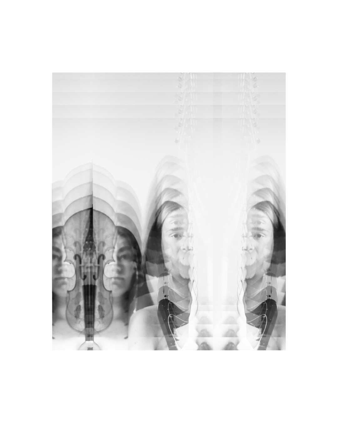Dark-haired women closely framed against a pale background in black and white.
