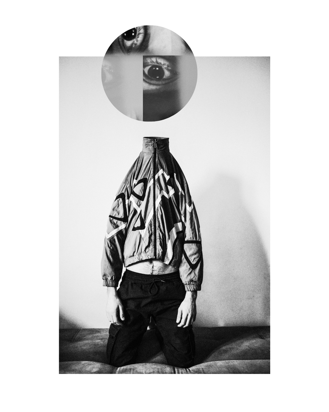 A figure with an obscured face on a pale background in black and white, by Lilit L Hovhanni.