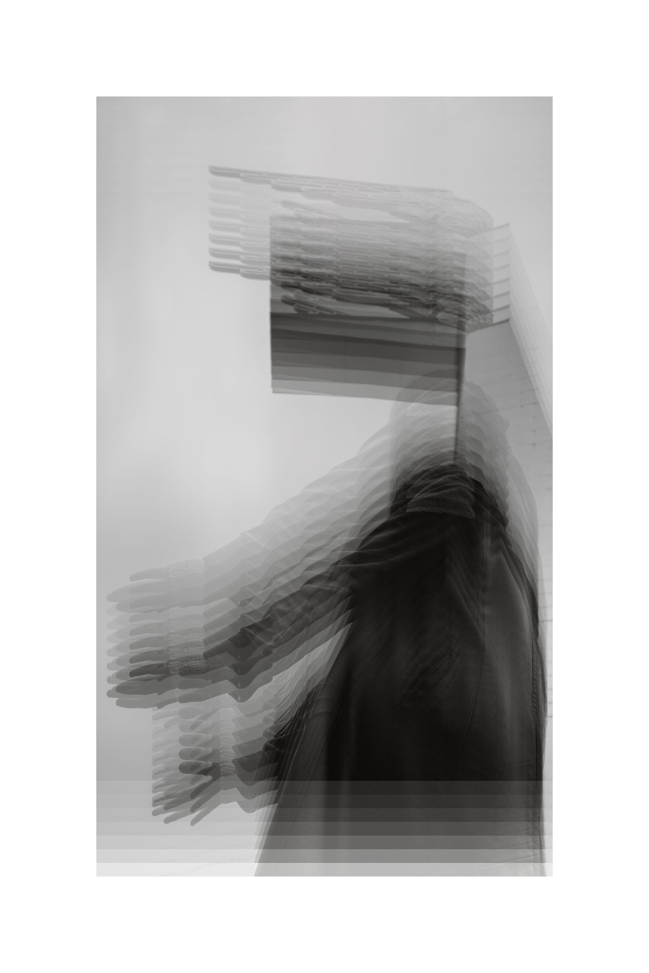 A grid of near-identical frames repeating one moment, in black and white.