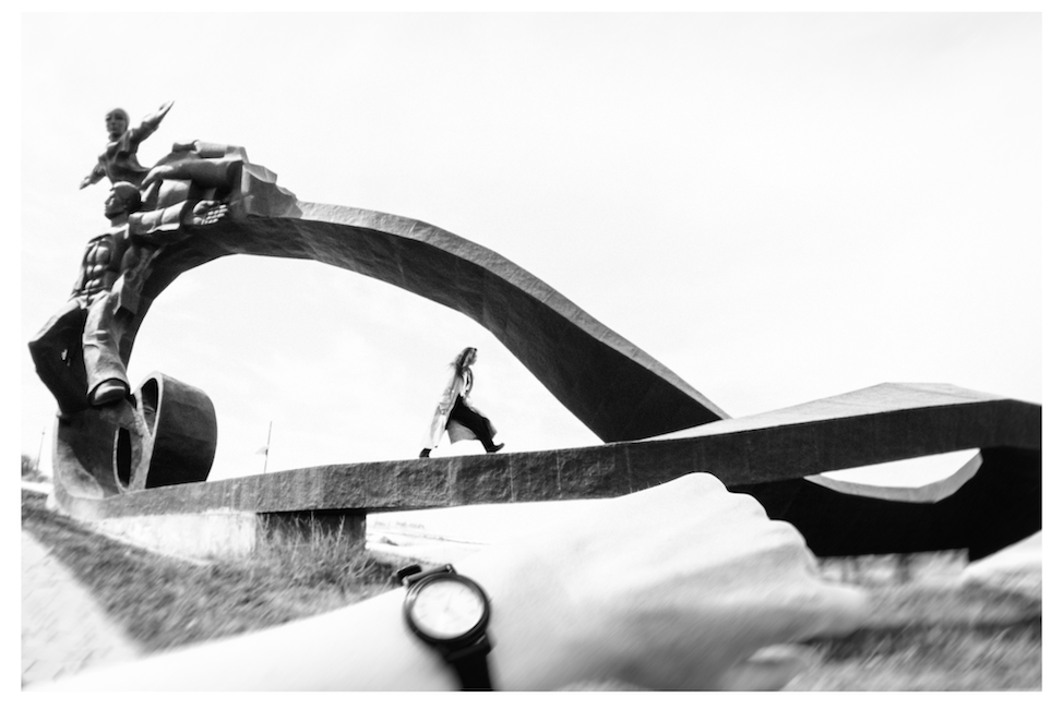 A woman and a monumental statue share the frame in Timeless by Lilit L Hovhanni.