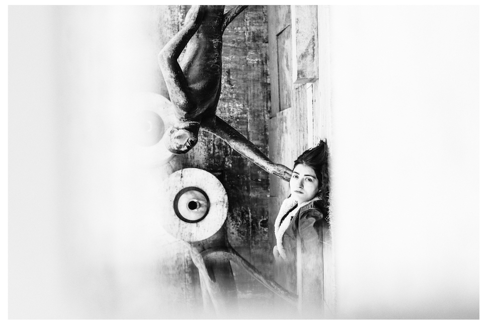 A woman and a monumental statue share the frame in Timeless by Lilit L Hovhanni.